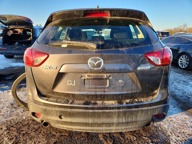 Photo 6 from auction – 2014 MAZDA CX-5 SPORT with VIN JM3KE2BE5E0334800