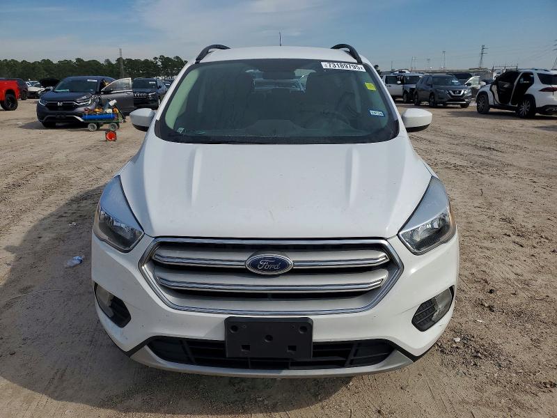 Photo 5 from auction – 2018 FORD ESCAPE with VIN 1FMCU0GD6JUD43718