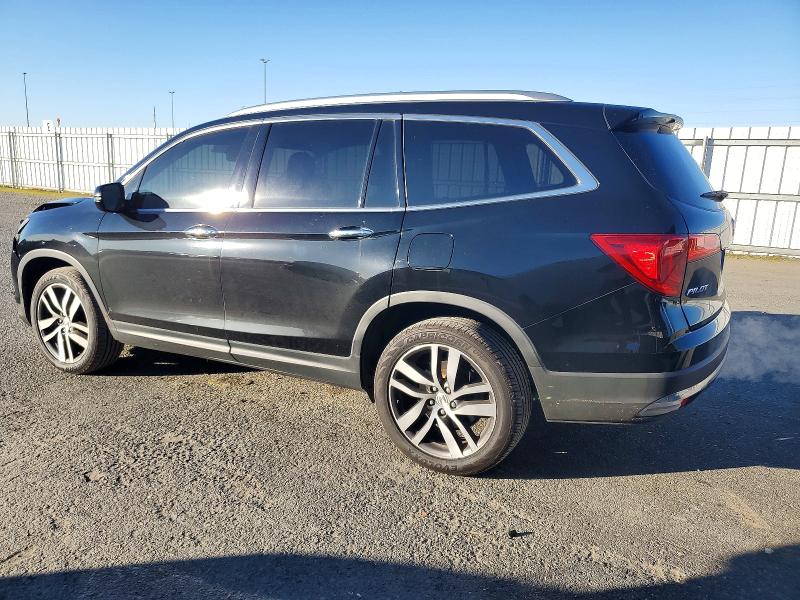 Photo 2 from auction – 2017 HONDA PILOT ELIT with VIN 5FNYF6H0XHB035893