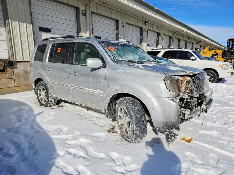 Photo 4 from auction – 2011 HONDA PILOT TOUR with VIN 5FNYF4H98BB076629