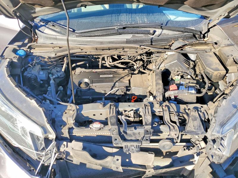 Photo 12 from auction – 2016 HONDA CR-V with VIN 2HKRM3H32GH528390