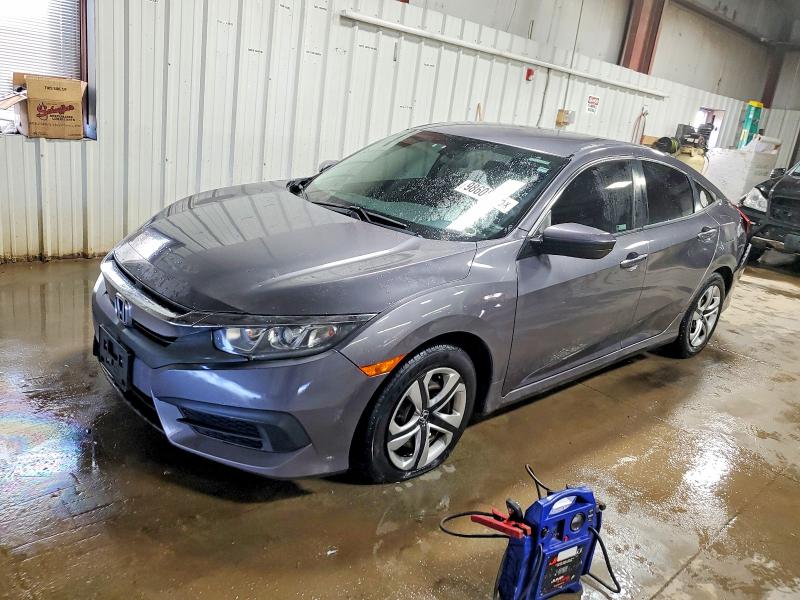 HONDA CIVIC 2018 with VIN 19XFC2F52JE031193 - Photo from auction