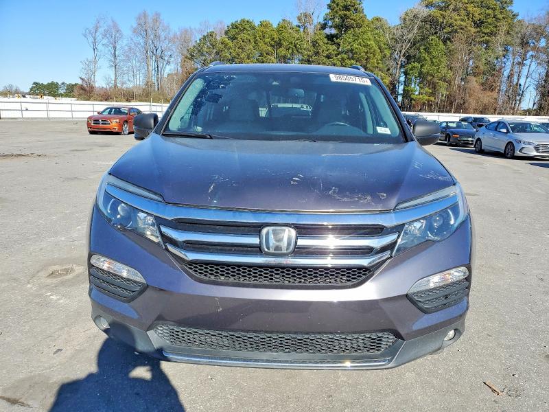 Photo 5 from auction – 2017 HONDA PILOT TOUR with VIN 5FNYF6H98HB012093