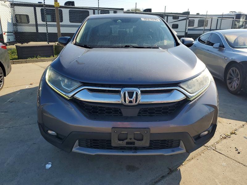 Photo 5 from auction – 2018 HONDA CR-V EX with VIN 7FARW2H54JE010717