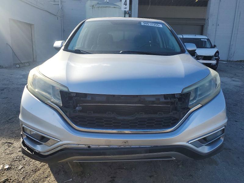 Photo 5 from auction – 2016 HONDA CR-V with VIN 2HKRM3H54GH517070