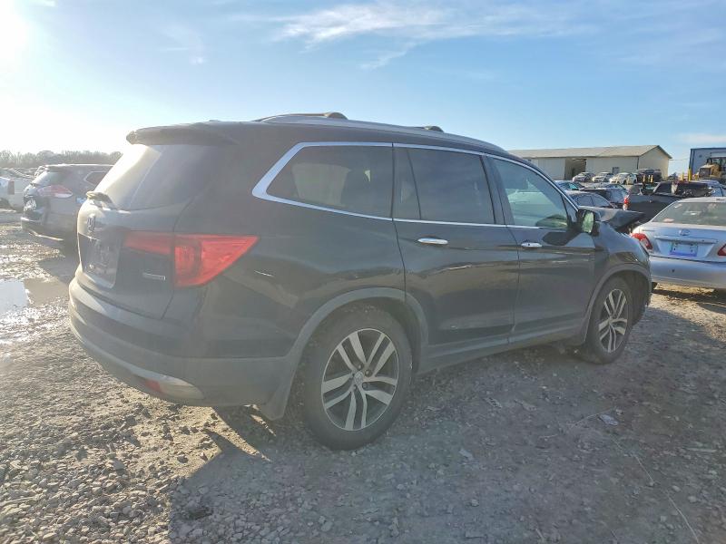 Photo 3 from auction – 2016 HONDA PILOT TOUR with VIN 5FNYF5H94GB050784