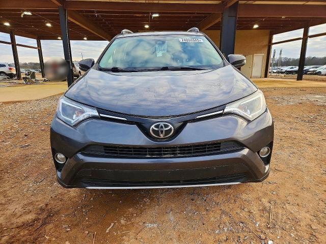 Photo 5 from auction – 2017 TOYOTA RAV4 with VIN JTMWFREV7HJ704901