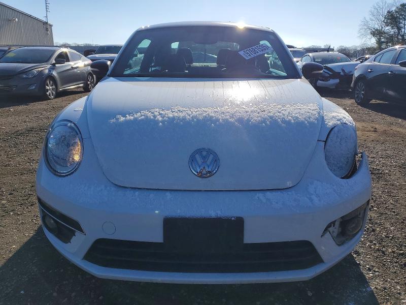 Photo 5 from auction – 2013 VOLKSWAGEN BEETLE with VIN 3VW4S7AT7DM684736