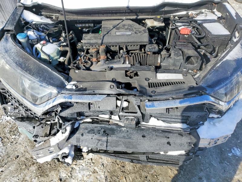 Photo 12 from auction – 2018 HONDA CR-V with VIN 7FARW2H89JE000324