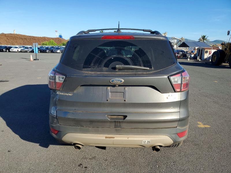 Photo 6 from auction – 2017 FORD ESCAPE with VIN 1FMCU0GDXHUC73330
