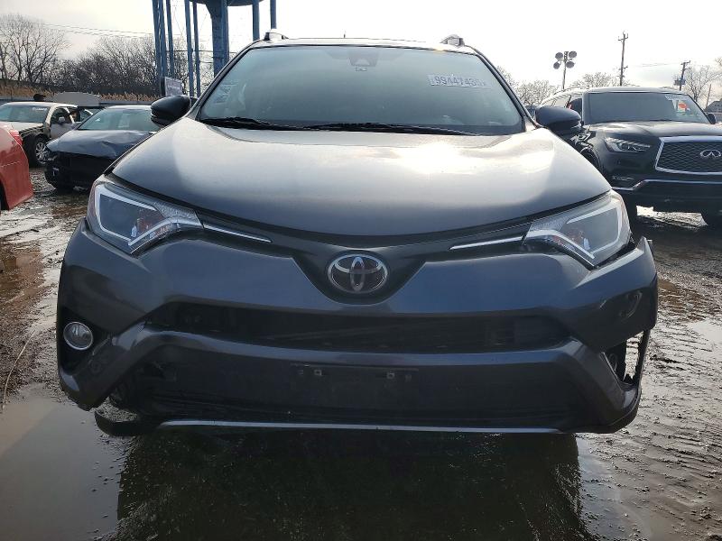 Photo 5 from auction – 2017 TOYOTA RAV4 XLE with VIN JTMWFREV0HD093589