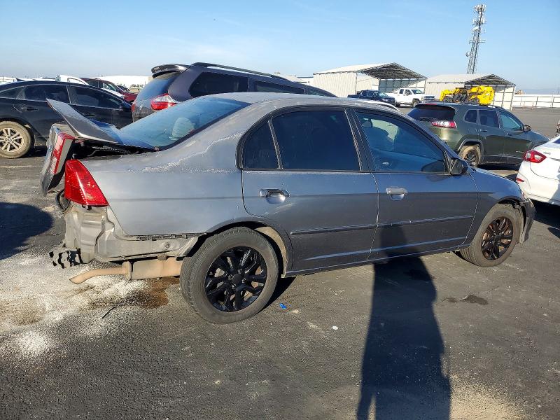 Photo 3 from auction – 2004 HONDA CIVIC LX with VIN 2HGES16514H511129