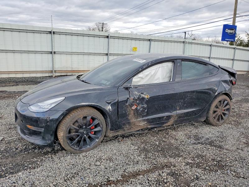 TESLA MODEL 3 2020 with VIN 5YJ3E1EBXLF520646 - Photo from auction