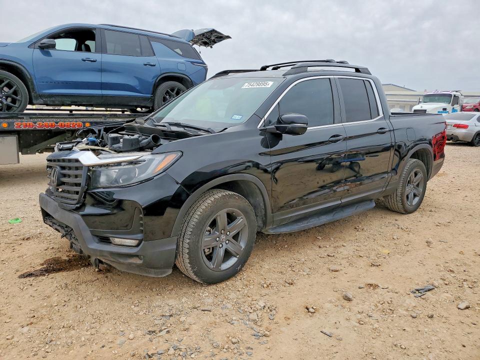 HONDA RIDGELINE 2023 with VIN 5FPYK3F53PB043090 - Photo from auction