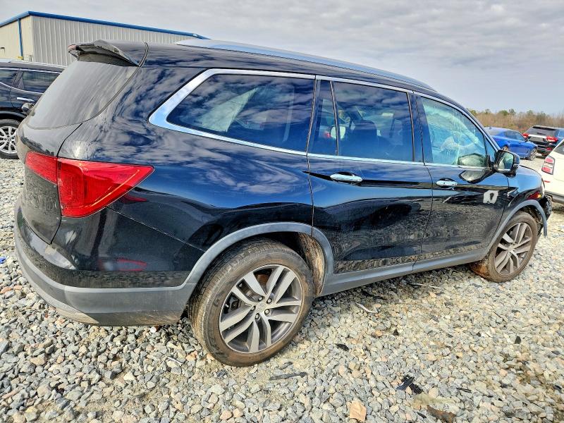 Photo 3 from auction – 2017 HONDA PILOT TOUR with VIN 5FNYF5H98HB045671
