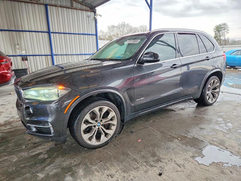 BMW X5 XDRIVE5 2014 with VIN 5UXKR6C57E0C02139 - Photo from auction