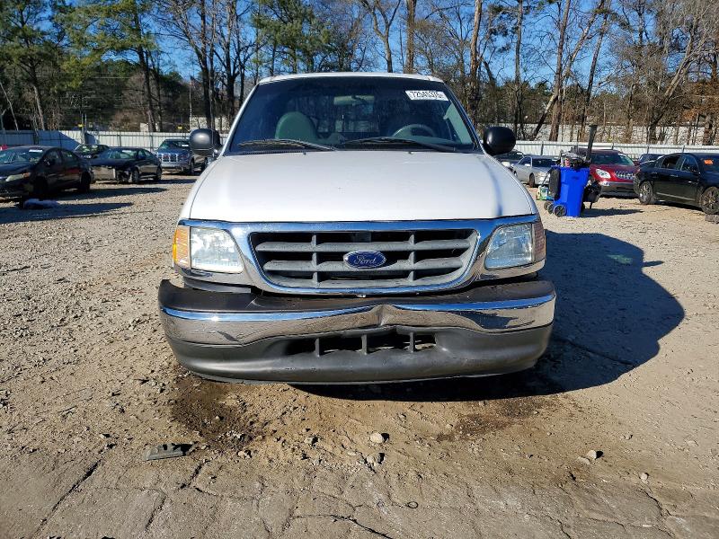 Photo 5 from auction – 2003 FORD F150 SUPER with VIN 1FTRW07693KD56617