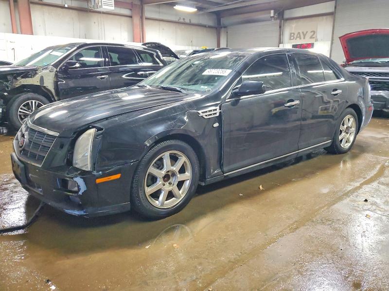 CADILLAC STS LUXURY 2011 with VIN 1G6DW6ED2B0158666 - Photo from auction