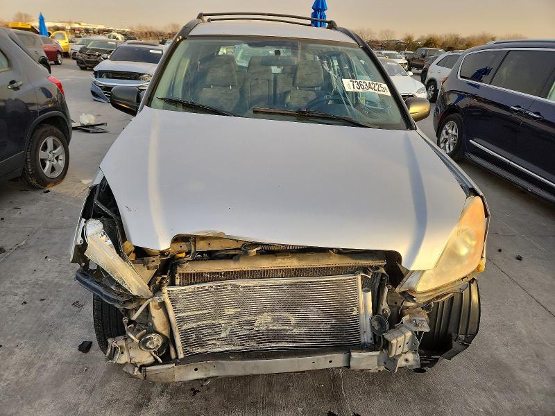 Photo 5 from auction – 2002 HONDA CR-V LX with VIN JHLRD68422C023564