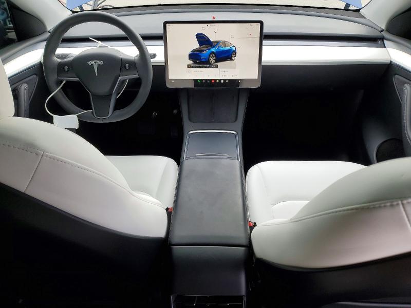 Photo 8 from auction – 2023 TESLA MODEL Y with VIN 7SAYGDEE7PF899660