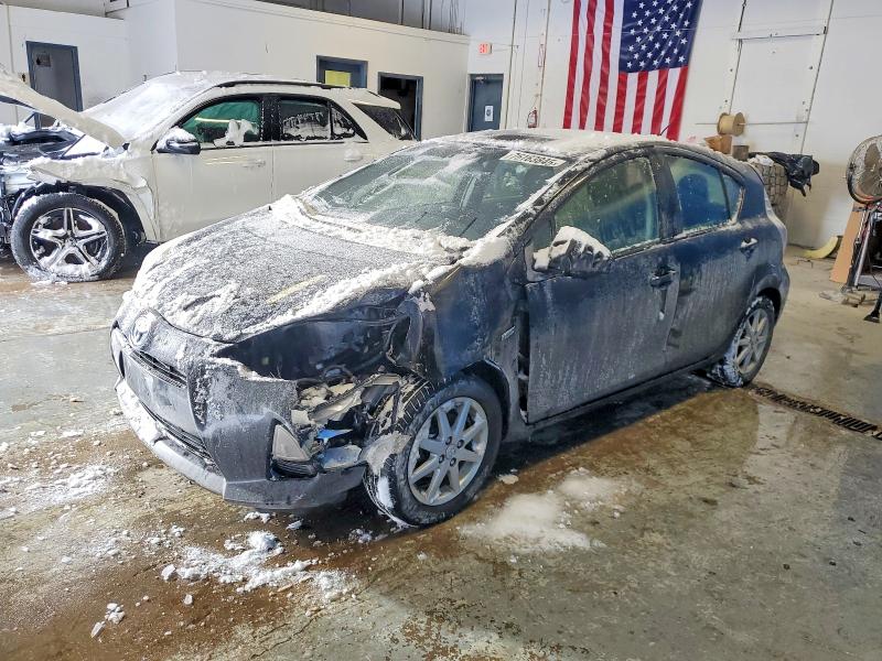 TOYOTA PRIUS C 2014 with VIN JTDKDTB31E1083526 - Photo from auction