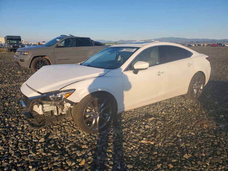 MAZDA 6 2017 with VIN JM1GL1W57H1141913 - Photo from auction