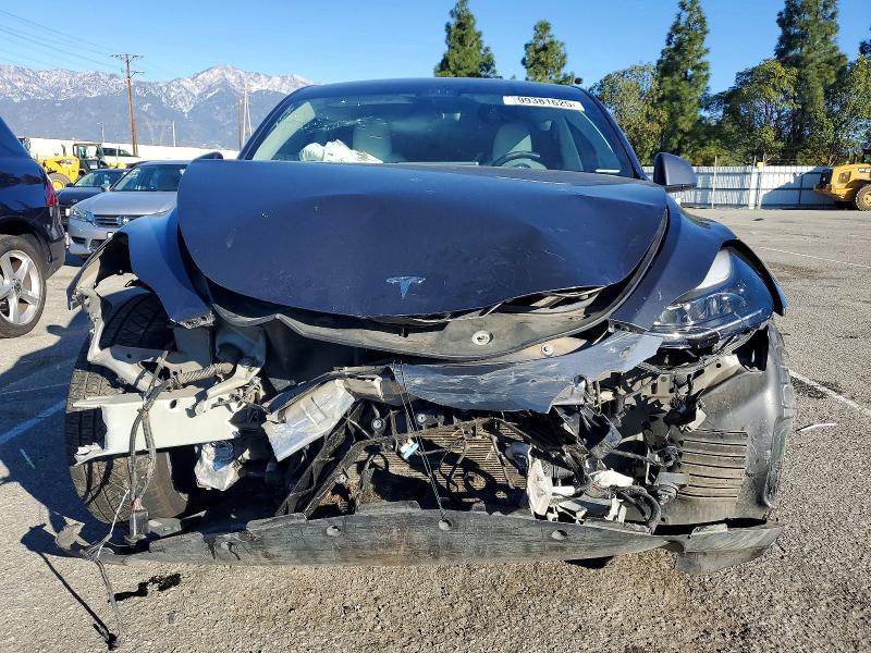 Photo 5 from auction – 2022 TESLA MODEL Y with VIN 7SAYGDEF0NF405984