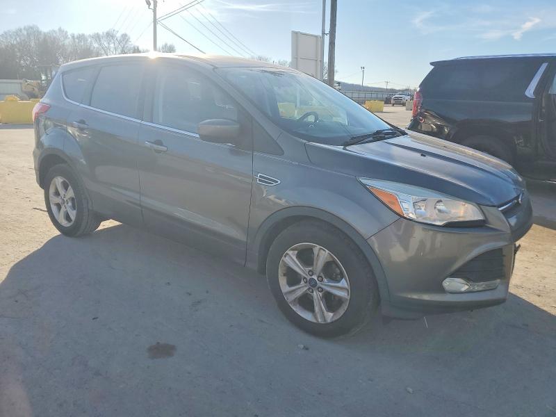 Photo 4 from auction – 2014 FORD ESCAPE with VIN 1FMCU0GX6EUD18480