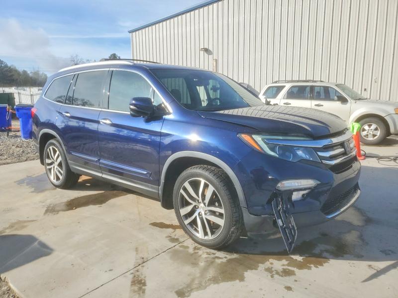 Photo 4 from auction – 2017 HONDA PILOT with VIN 5FNYF5H95HB015138