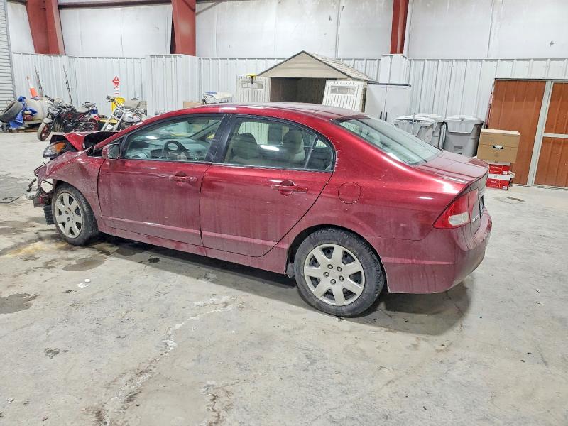 Photo 2 from auction – 2010 HONDA CIVIC LX with VIN 2HGFA1F53AH538576