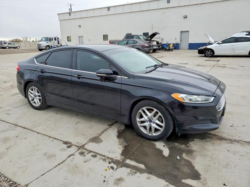 Photo 4 from auction – 2016 FORD FUSION with VIN 3FA6P0H70GR215739
