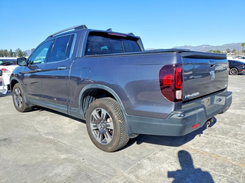 Photo 2 from auction – 2018 HONDA RIDGELINE with VIN 5FPYK3F74JB015548