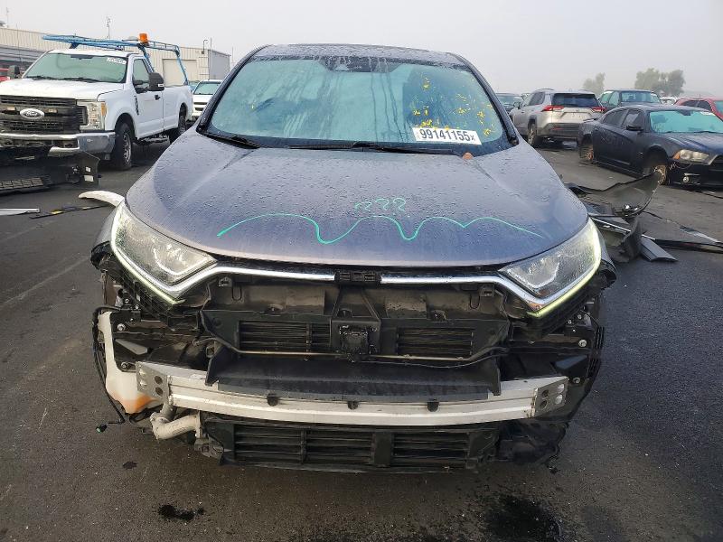 Photo 5 from auction – 2017 HONDA CR-V with VIN 7FARW1H57HE043263