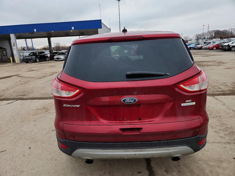 Photo 6 from auction – 2014 FORD ESCAPE with VIN 1FMCU0GX6EUA04120