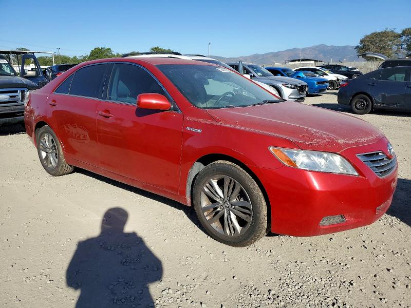Photo 4 from auction – 2007 TOYOTA CAMRY HYBR with VIN JTNBB46KX73010302