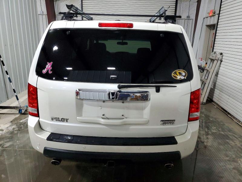 Photo 6 from auction – 2011 HONDA PILOT TOUR with VIN 5FNYF4H97BB017264
