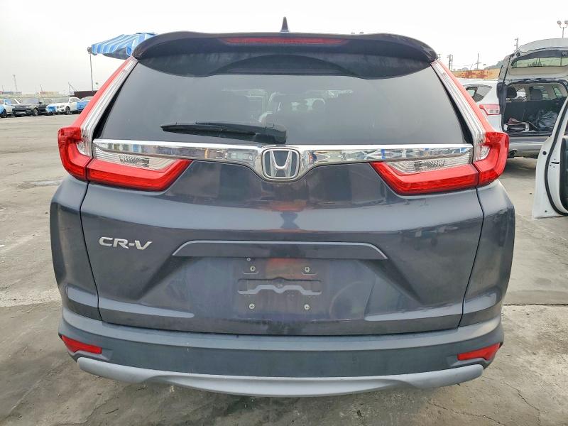Photo 6 from auction – 2018 HONDA CR-V EX with VIN 2HKRW1H59JH516079