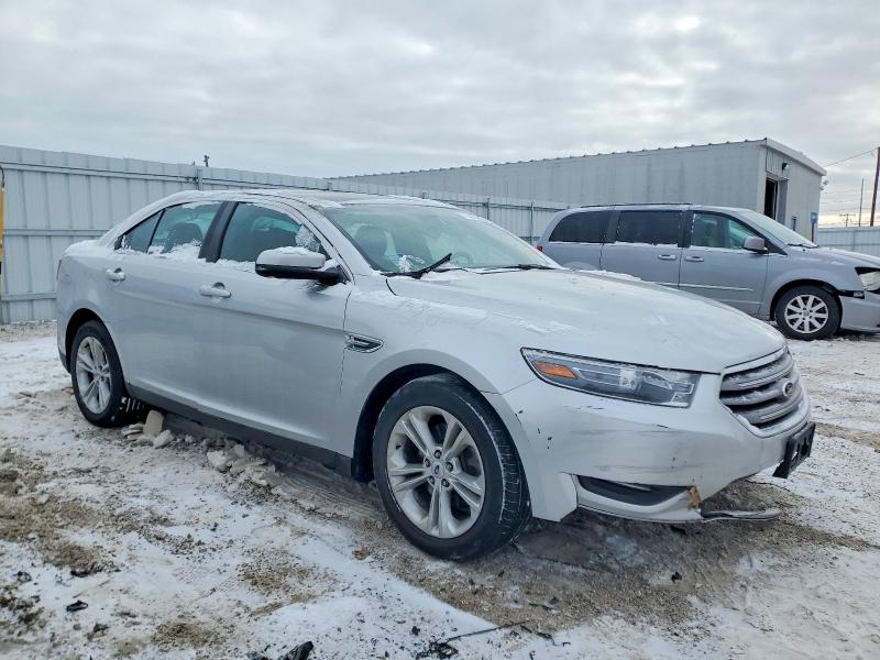 Photo 4 from auction – 2013 FORD TAURUS SEL with VIN 1FAHP2E80DG142909