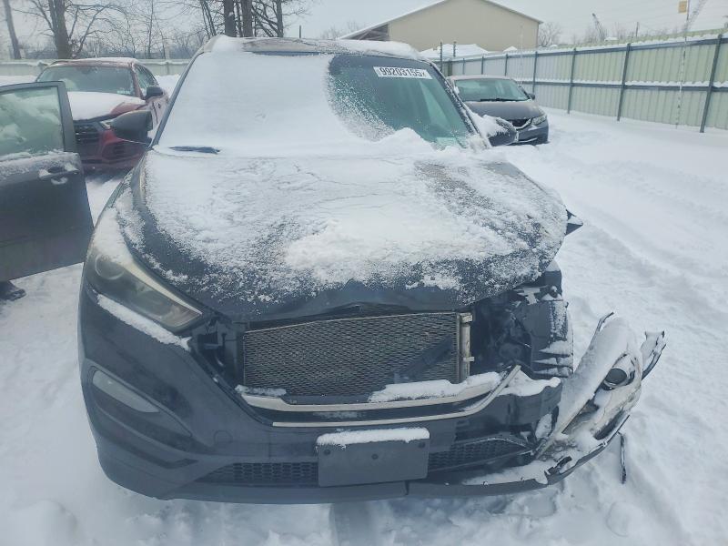 Photo 5 from auction – 2017 HYUNDAI TUCSON LIM with VIN KM8J3CA4XHU546643
