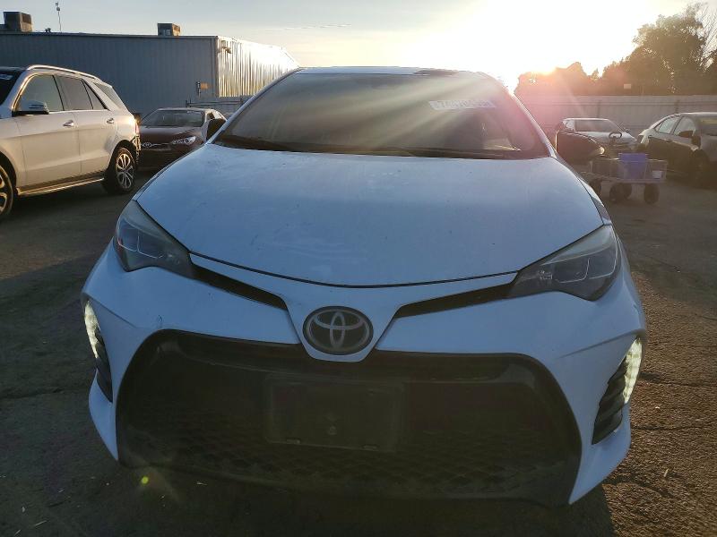 Photo 5 from auction – 2017 TOYOTA COROLLA with VIN 5YFBURHE7HP577188