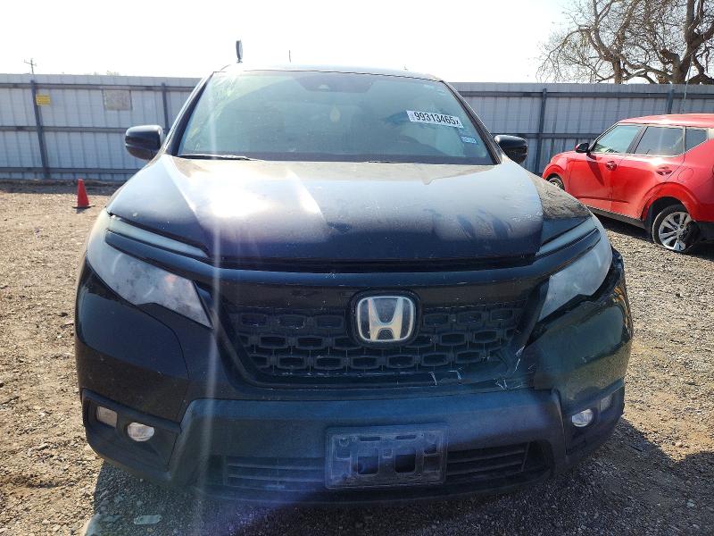 Photo 5 from auction – 2021 HONDA PASSPORT with VIN 5FNYF7H27MB007499