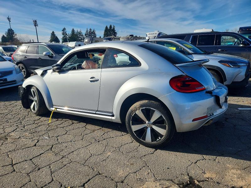 Photo 2 from auction – 2012 VOLKSWAGEN BEETLE TUR with VIN 3VW4A7AT2CM634943