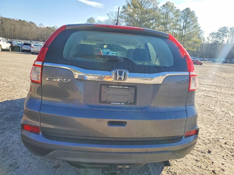 Photo 6 from auction – 2016 HONDA CR-V with VIN 2HKRM3H32GH528390