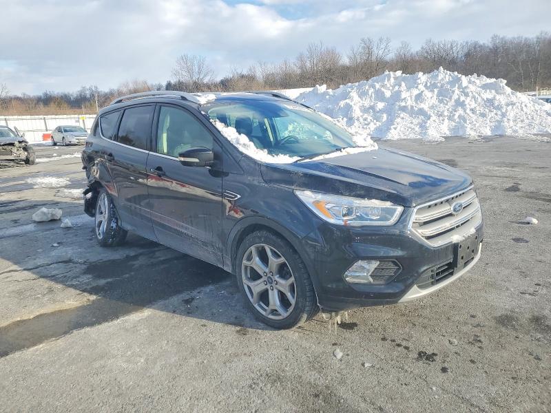 Photo 4 from auction – 2019 FORD ESCAPE with VIN 1FMCU9J99KUA85351