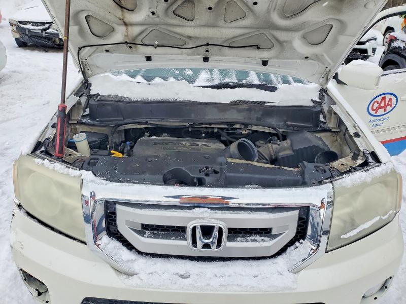 Photo 12 from auction – 2011 HONDA PILOT TOUR with VIN 5FNYF4H94BB505619