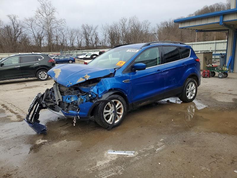 FORD ESCAPE 2017 with VIN 1FMCU0GDXHUD74643 - Photo from auction