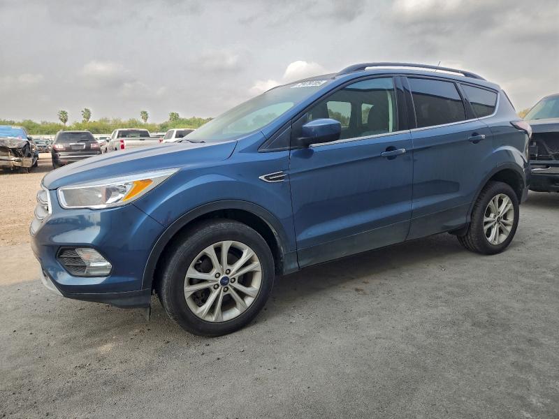 FORD ESCAPE SE 2018 with VIN 1FMCU0GDXJUC85760 - Photo from auction