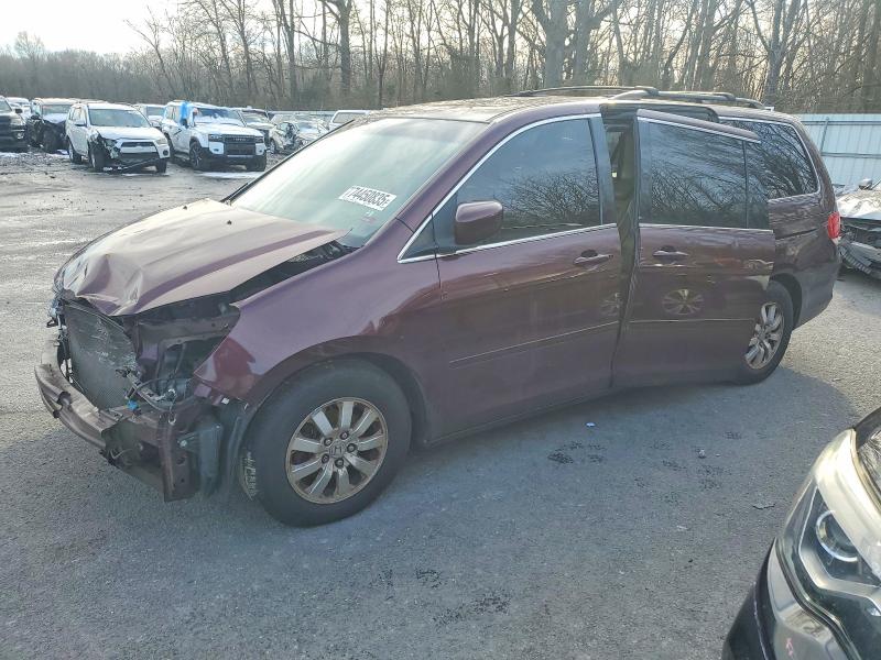 HONDA ODYSSEY 2010 with VIN 5FNRL3H75AB058464 - Photo from auction