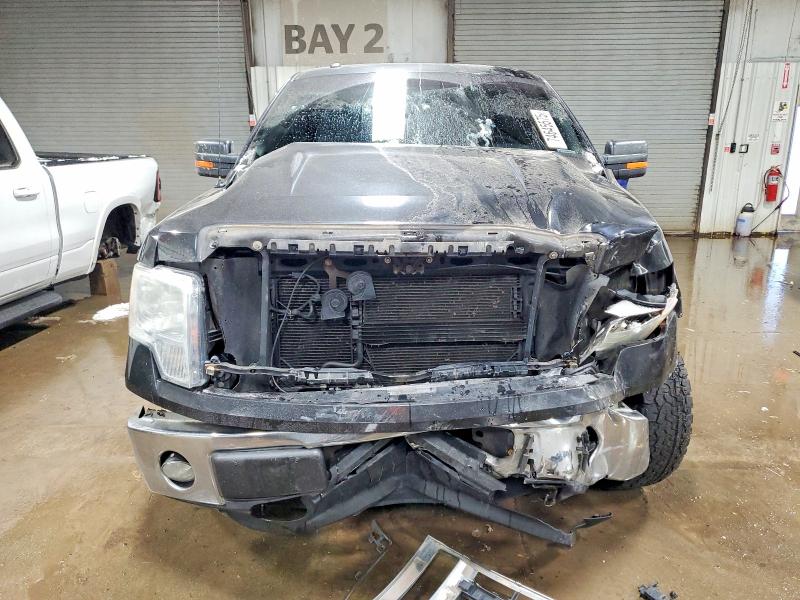 Photo 5 from auction – 2011 FORD F150 with VIN 1FTMF1EF2BKD46626