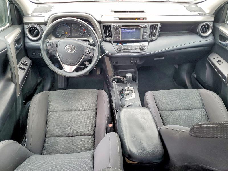 Photo 8 from auction – 2018 TOYOTA RAV4 with VIN 2T3WFREV2JW482002